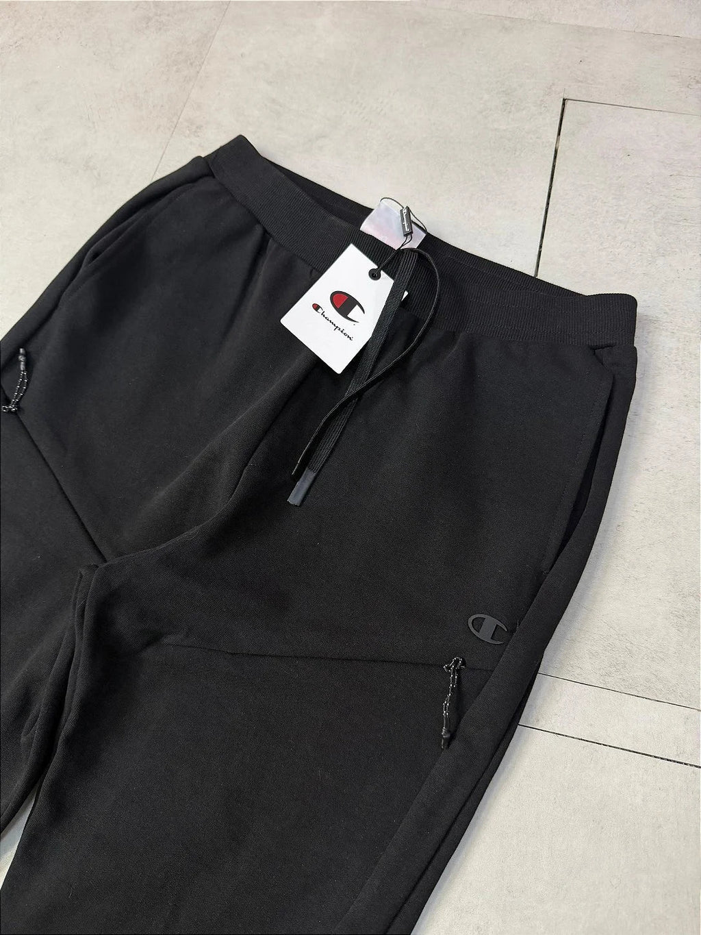 CALÇA MOLETOM TECH CHAMPION “Diagonal Zip”